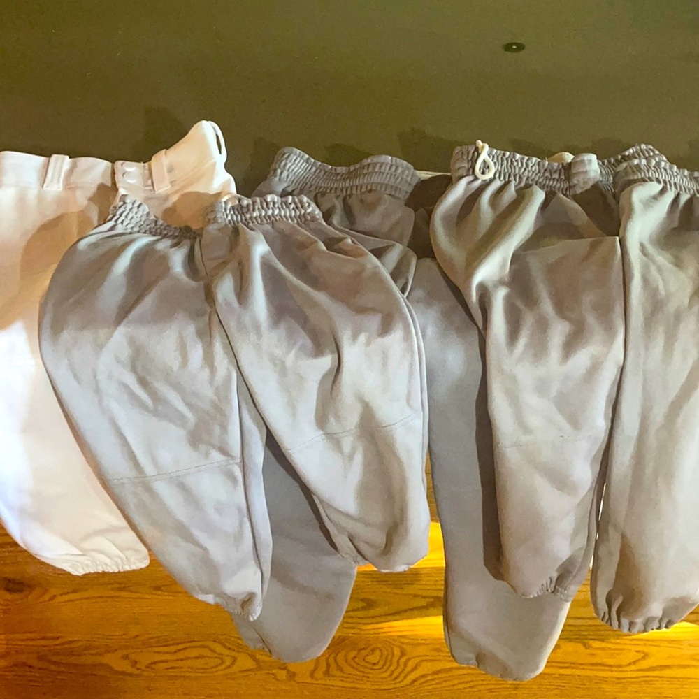 Assortment of baseball/ softball pants ranging from tball to youth